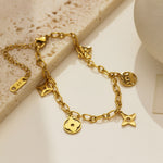 Load image into Gallery viewer, Gold Cutout Clover Fringe Bracelet