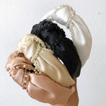 Load image into Gallery viewer, Crystal bow mercerized satin covered headband