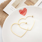 Load image into Gallery viewer, Heart huggie earring