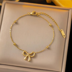 Load image into Gallery viewer, Bow tie link chain bracelet