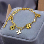Load image into Gallery viewer, Gold Cutout Clover Fringe Bracelet
