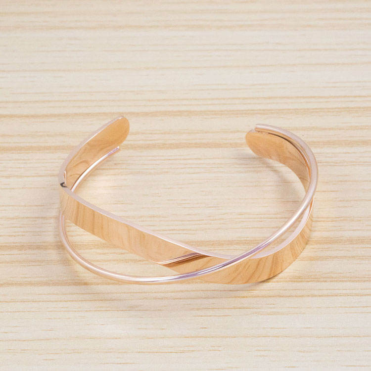 Rosegold wave intersect lrregular twisted open bangle