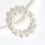 Load image into Gallery viewer, Pearl Hair Tie
