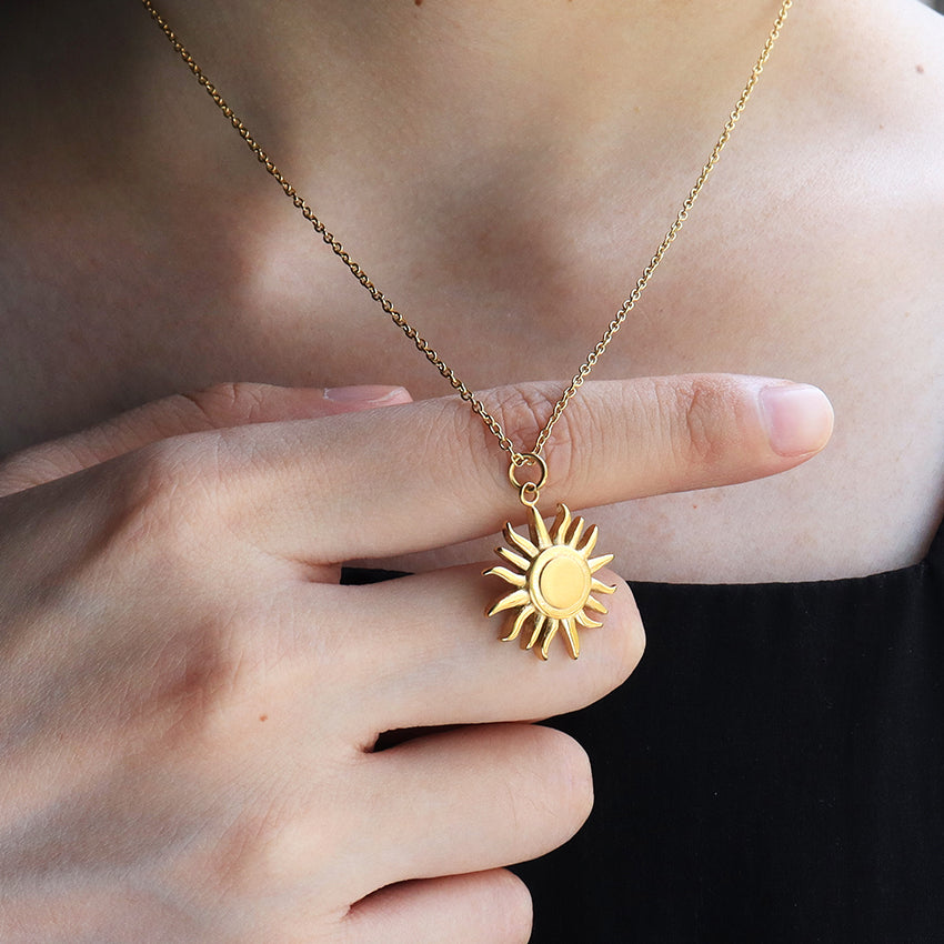 sun charm pendent