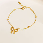 Bow tie link chain bracelet