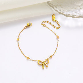 Bow tie link chain bracelet