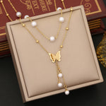 Load image into Gallery viewer, Pearl butterfly pendant

