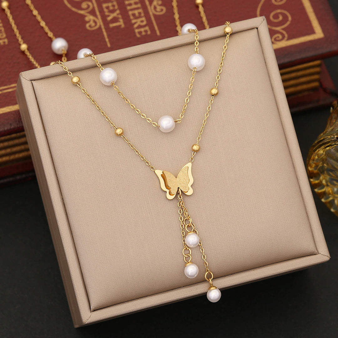 Pearl butterfly pendant