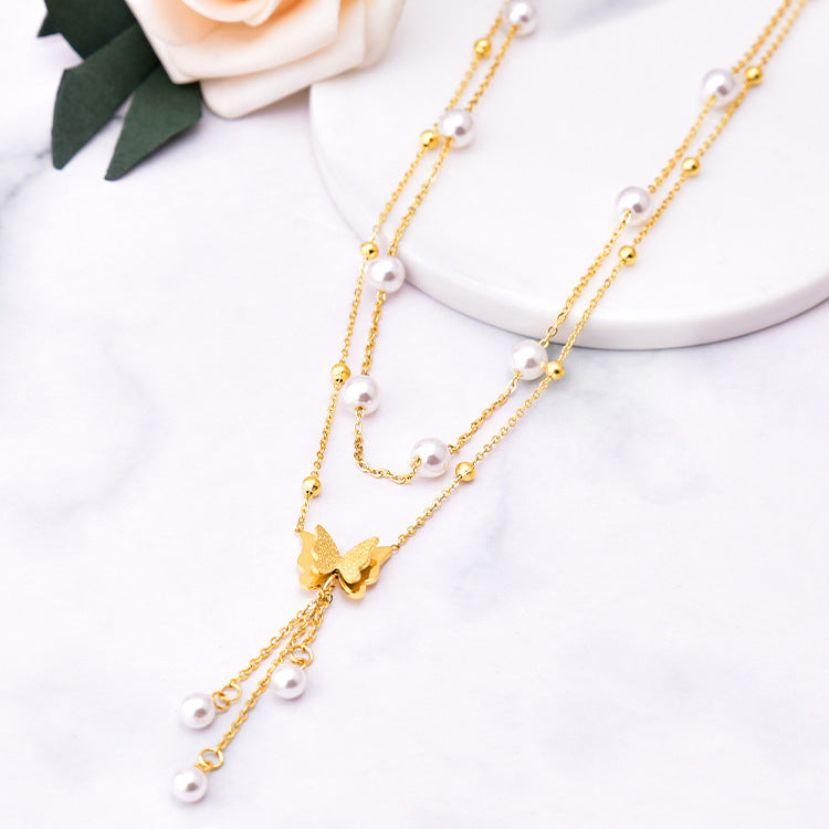 Pearl butterfly pendant