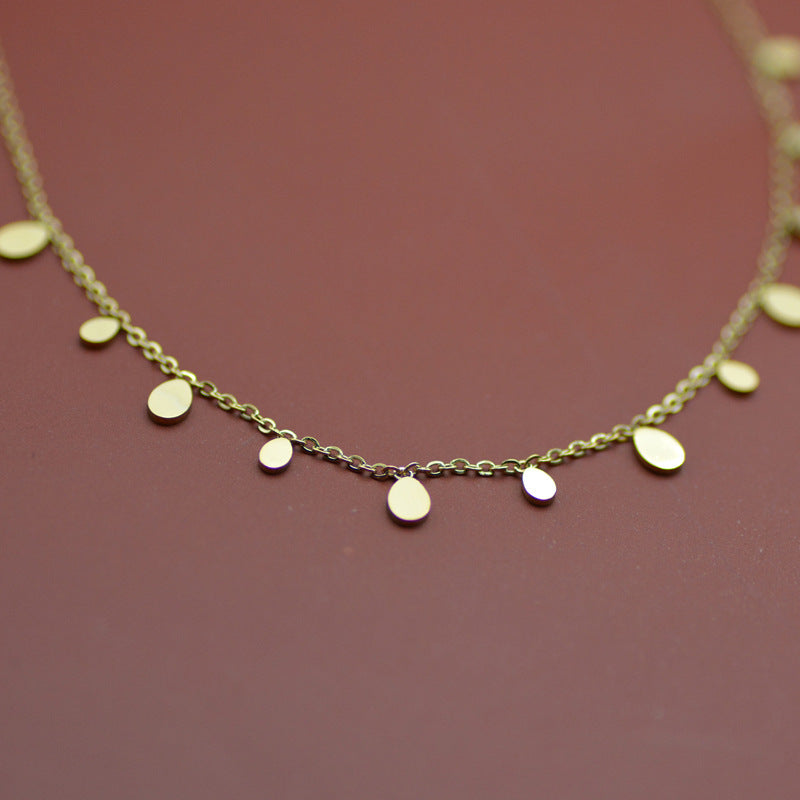 Fringed Choker dangling gold drop pendant