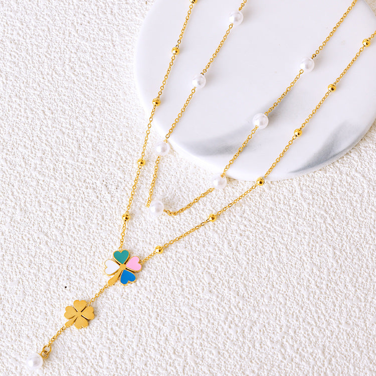 Pearl four leaf clove pendent