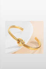 Load image into Gallery viewer, Knot open bangle
